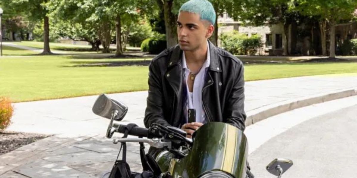 Russ sitting on a motorcycle in Do Revenge
